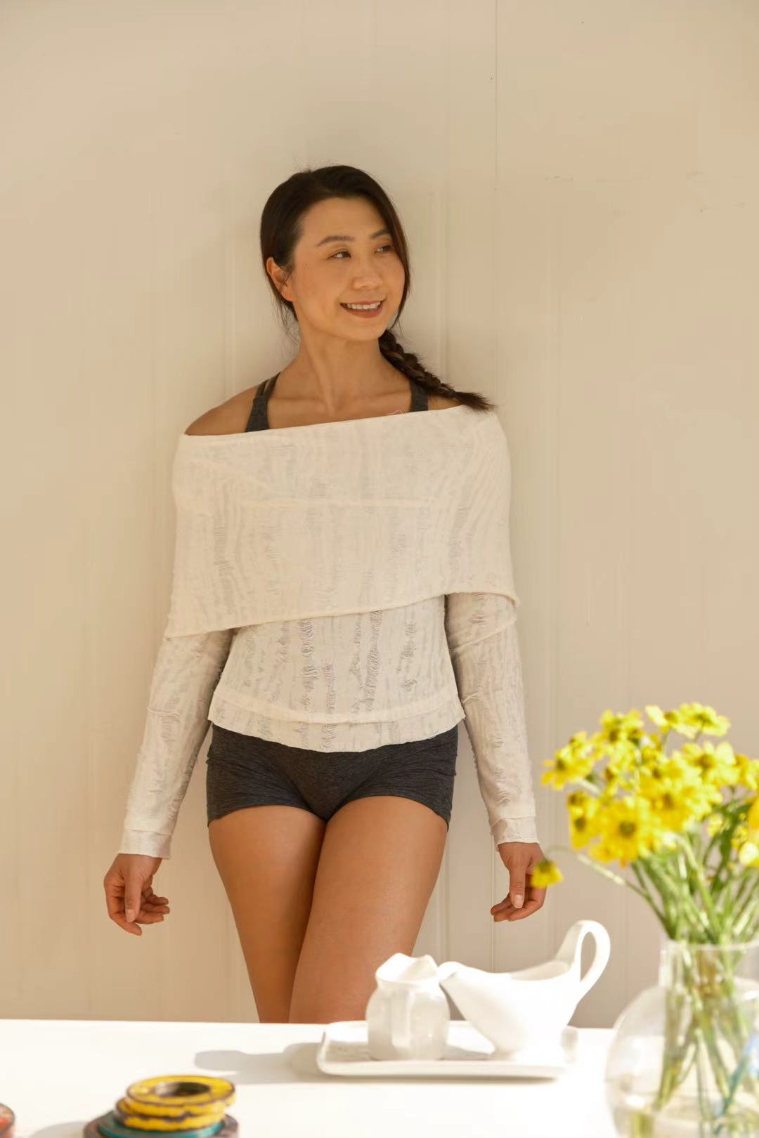 Model wearing Leyla Iron Lilies top