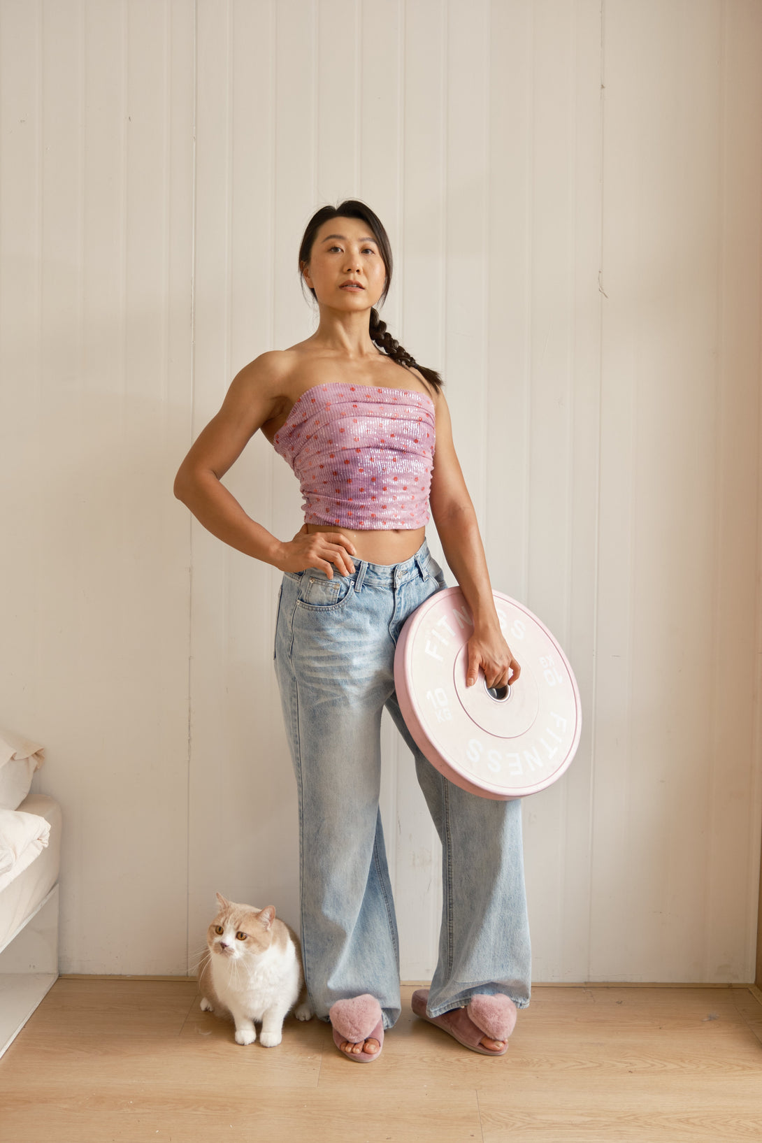 Woman in form-fitting activewear with confident expression